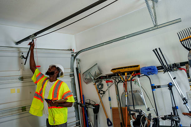Professional Garage Door Panel Replacement technician working in Albertson, NY